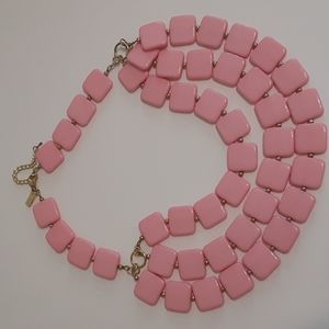 "Our world" pink and gold tone Theate Bib necklace